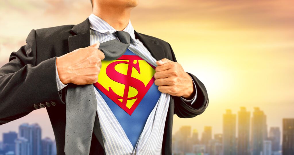 businessman in superhero costume with dollar sign